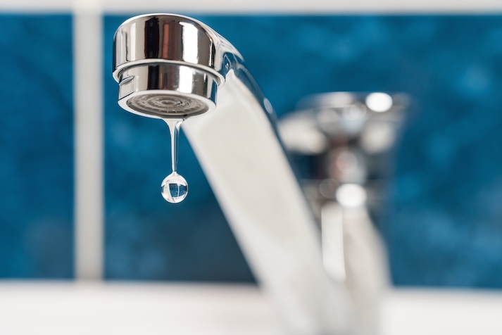 The image displays a leaky faucet example. 