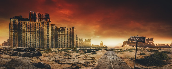apocalyptic scene Evening post apocalyptic background image of desert city wasteland with abandoned and destroyed buidings, cracked road and sign.