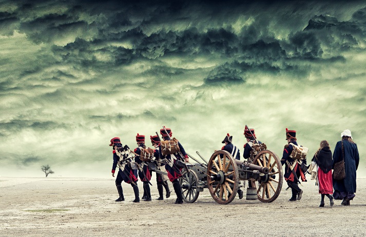 The Battle of Austerlitz. Napoleon soldiers marching in open land with dramatic sky above. The Battle of the Three Emperors. The Battle of Austerlitz.