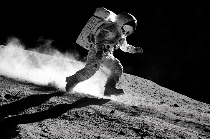 Astronaut leaps on moon’s surface Astronaut leaps on moon’s surface, dust trailing in slow-motion silence