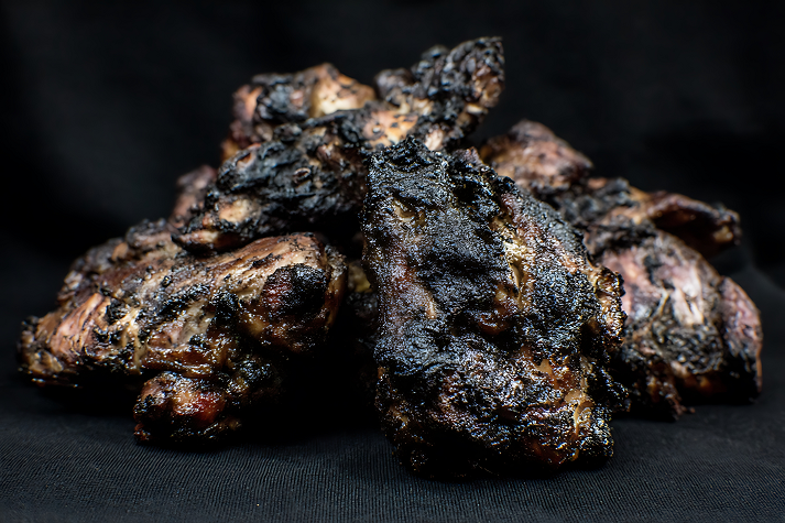 burnt jerk chicken pieces