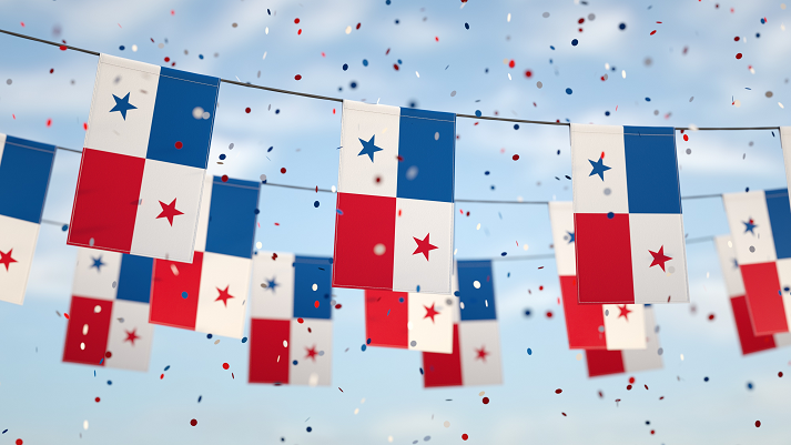 Panamanian flags in the sky with confetti.