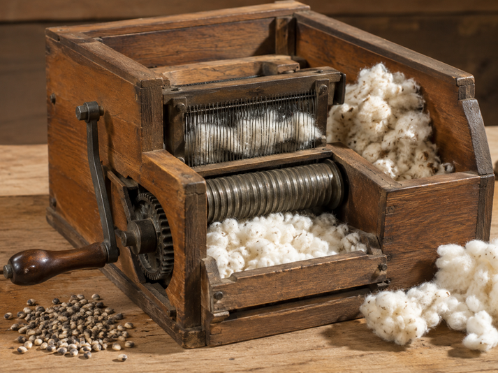 Vintage cotton gin on wooden tabletop