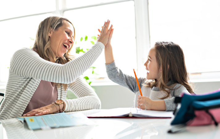 A Mother and Child doing homework at home