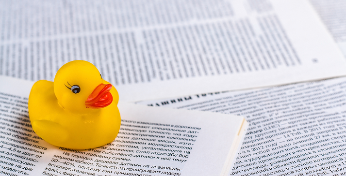 rubber duck and paper