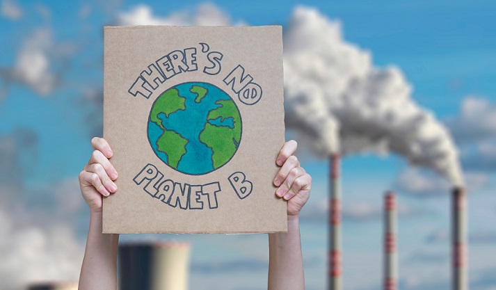 save the planet Climate change manifestation poster on an industrial fossil fuel burning