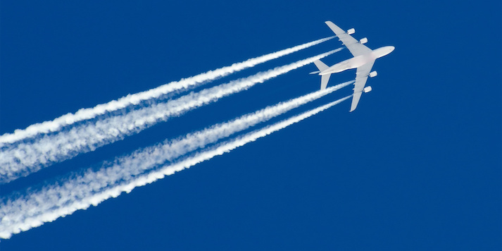 plane with four contrails plane with four contrails