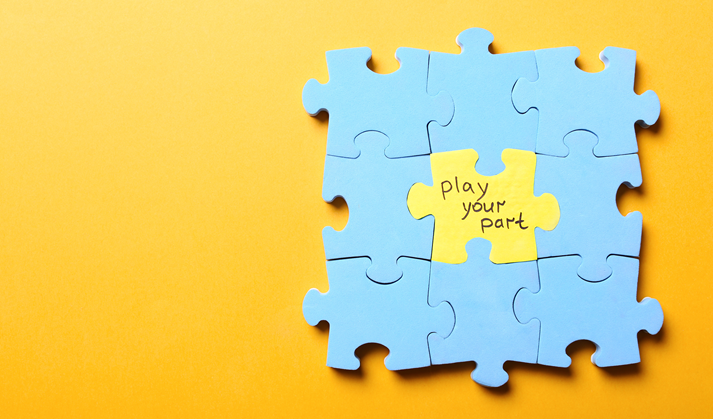 Jigsaw puzzle with phrase Play Your Part on yellow background, top view. Social responsibility concept