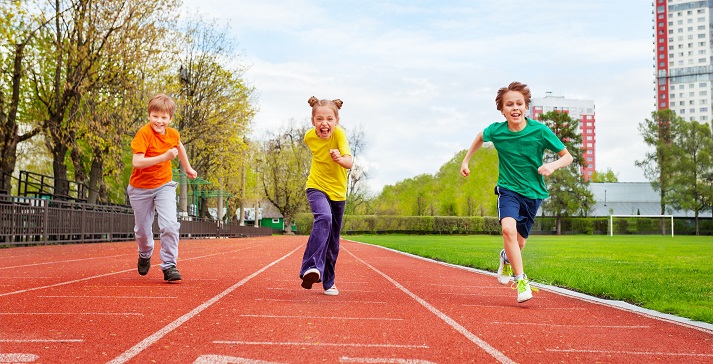 Children running the marathon on finish line