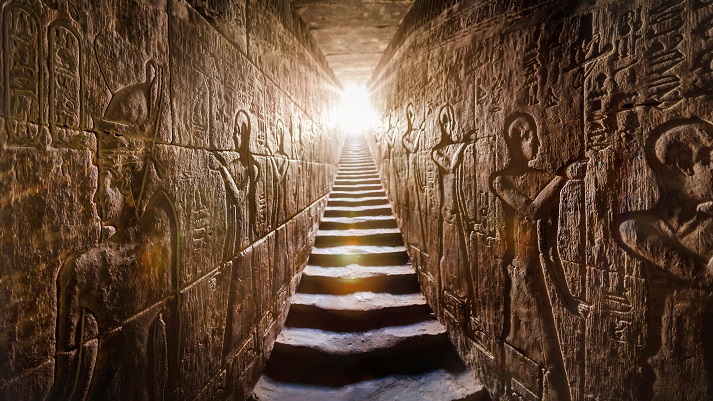 Aswan temple full of Egyptian hieroglyphs EGYPT Edfu, Aswan temple, completed by Ramses II (-1200). Passage flanked by two glowing walls full of Egyptian hieroglyphs